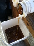 Honey pouring from extractor